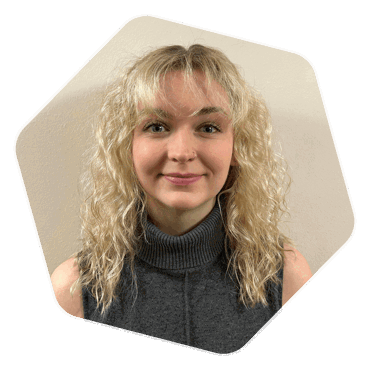 A headshot of Katie Trott from Woodland Group